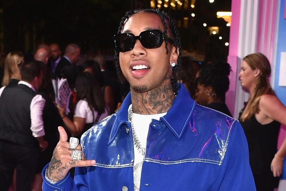 Tyga Sues Lil Wayne, Birdman For $1 Million