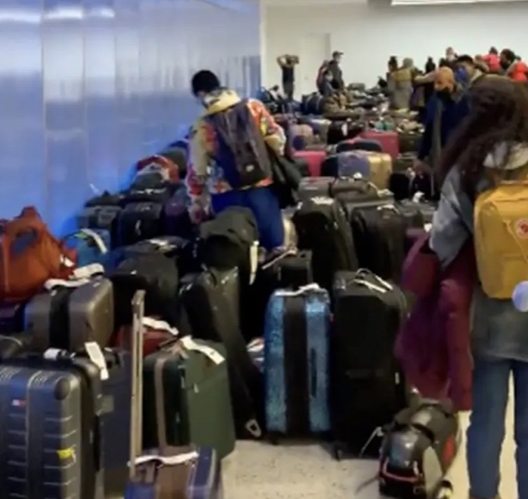 HUNDREDS Of FLIGHTS CANCELLED AT JFK DUE TO SNOWSTORM